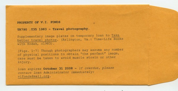 A  yellow envelope reading "Property of V.I. Fonds" TR790 .T35 1993 - Travel Photography. Supplementary image plates on temporary loan to Take Better Travel Photos/