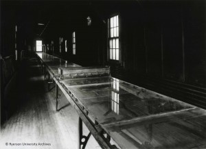 In 1889, George Eastman introduced Flexible Film in rolls, a lightweight, non-breakable substitute for glass. The transparent nitro-cellulose roll film base was cast on these 200-foot long tables.