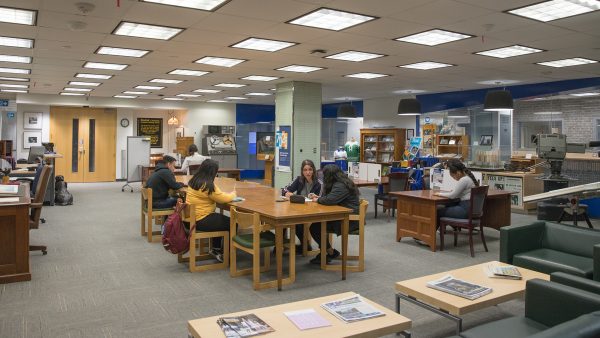 5 students working in the Archives & Special Collections reading room