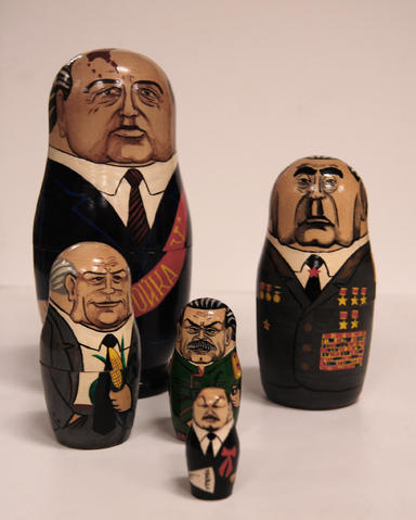 Painted wooden nesting or Matrioshkas dolls of Russian Communist leaders. Mikhail Gorbachev is the first and largest doll, inside which in succession are the leaders: Leonid Ilyich Brezhnev, Nikita Sergeyevich Khrushchev, Joseph Stalin, Vladimir Ilyich Lenin. Five dolls in total. 