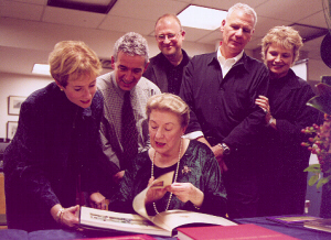 Lorraine Monk and Toronto Metropolitan University staff viewing the Monk Donation